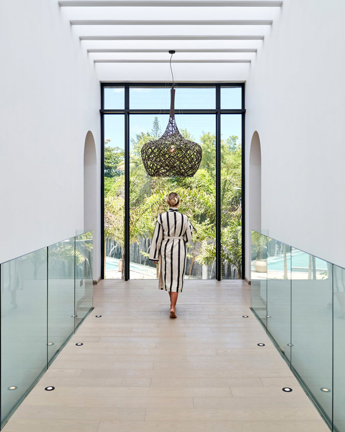 Walking through the LUX<bdi><bdi>*</bdi></bdi> Me Spa hallway at LUX<bdi><bdi>*</bdi></bdi> Grand Baie