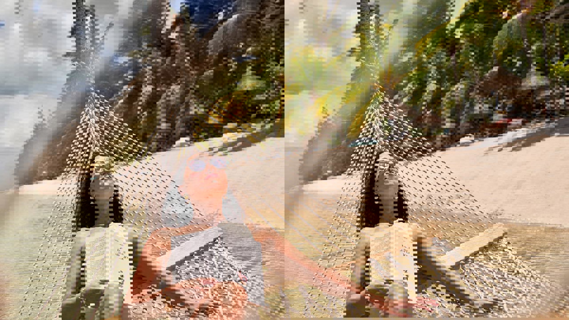 Lounging on a hammock on the beach of LUX* Le Morne