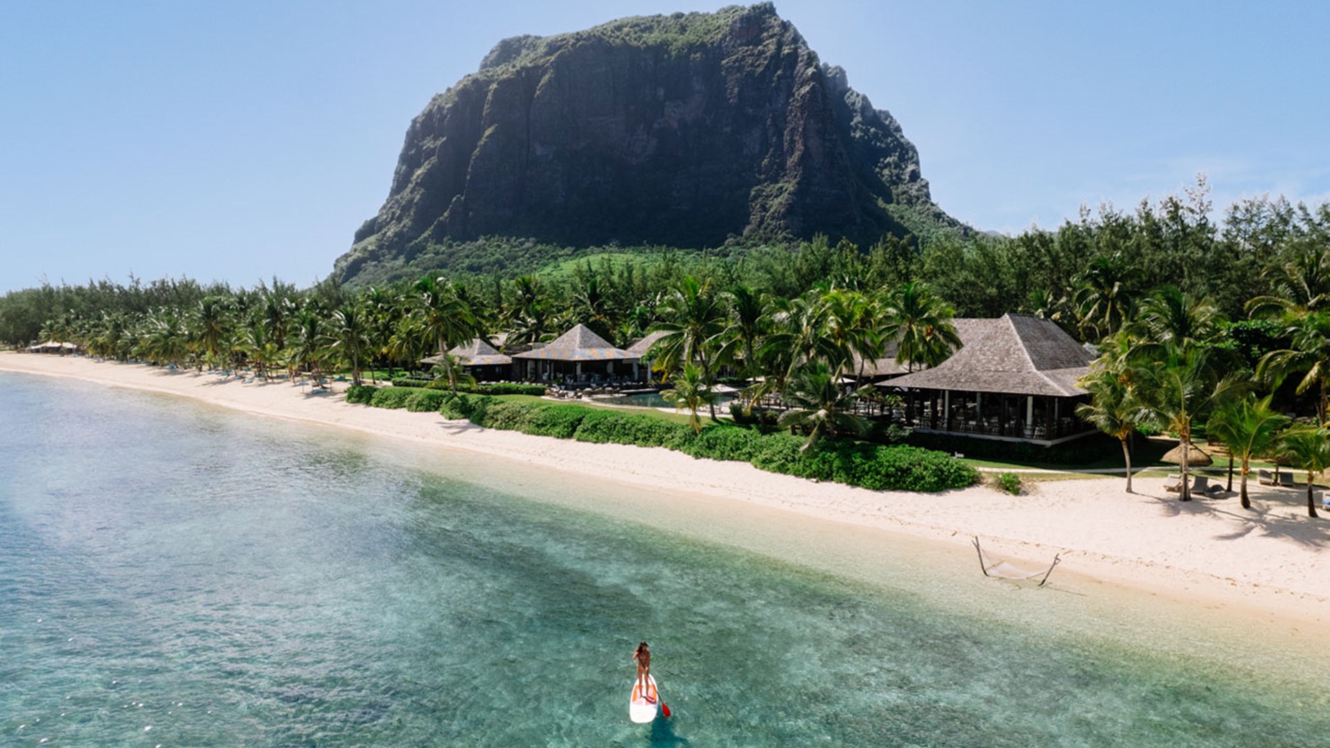 Aerial view of woman on a stand-up paddle at LUX* Le Morne