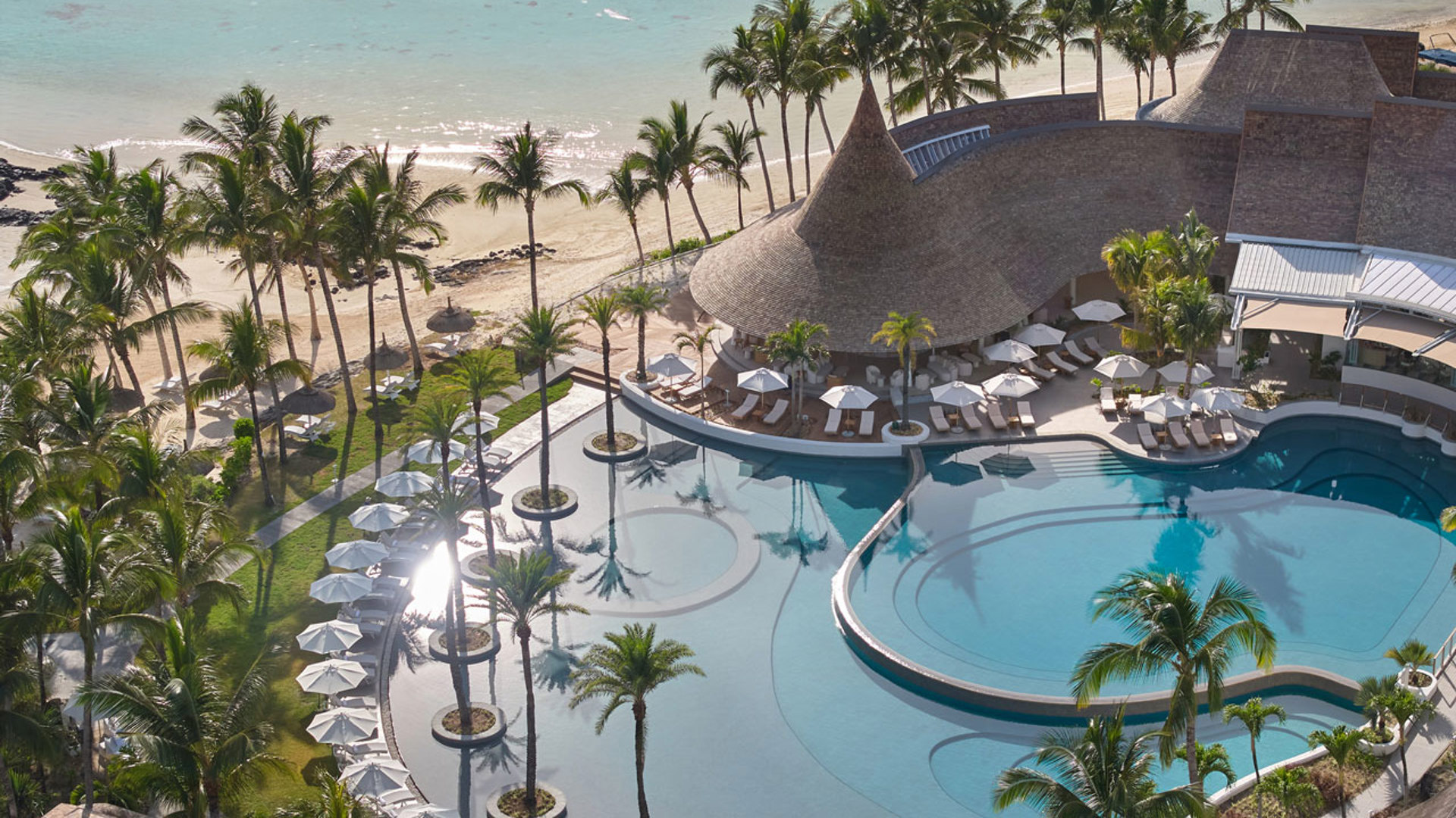 Aerial shot of LUX* Belle Mare's main pool