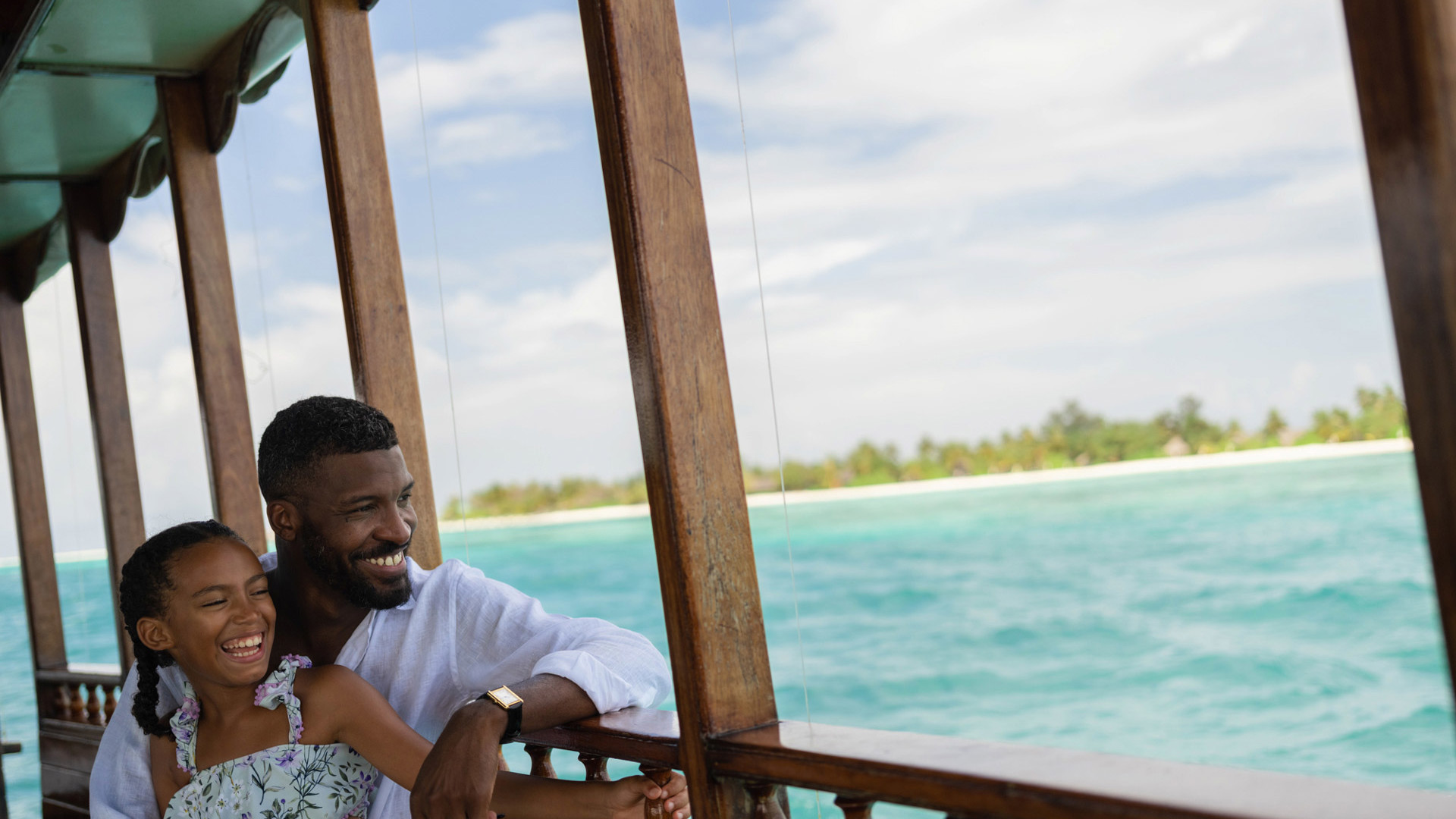 Father-Daughter on dhoni boat at LUX* South Ari Atoll