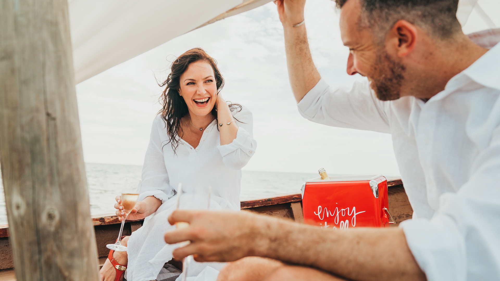 Couple on boat, drinking