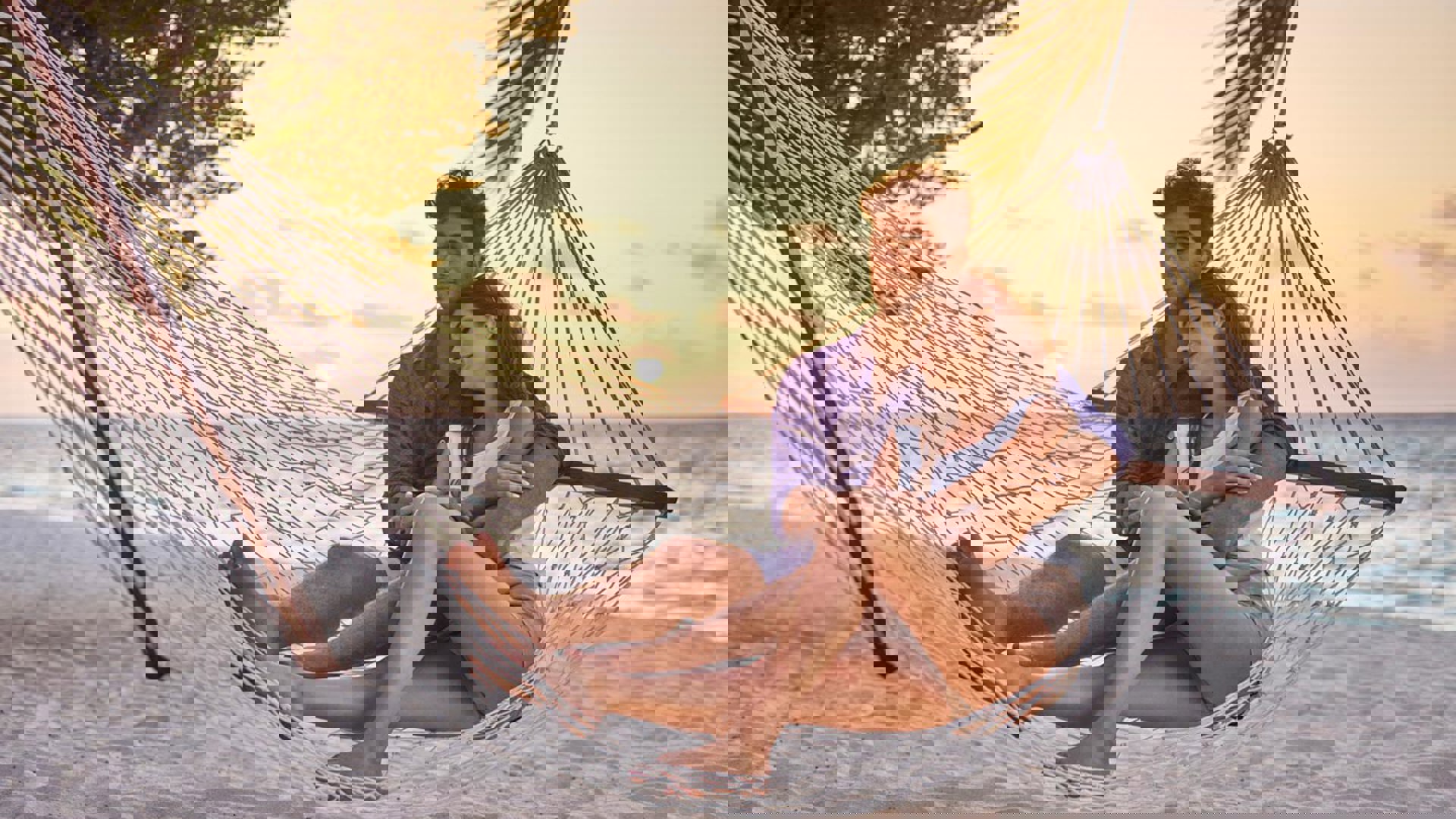 Couple on hammock at LUX* South Ari Atoll