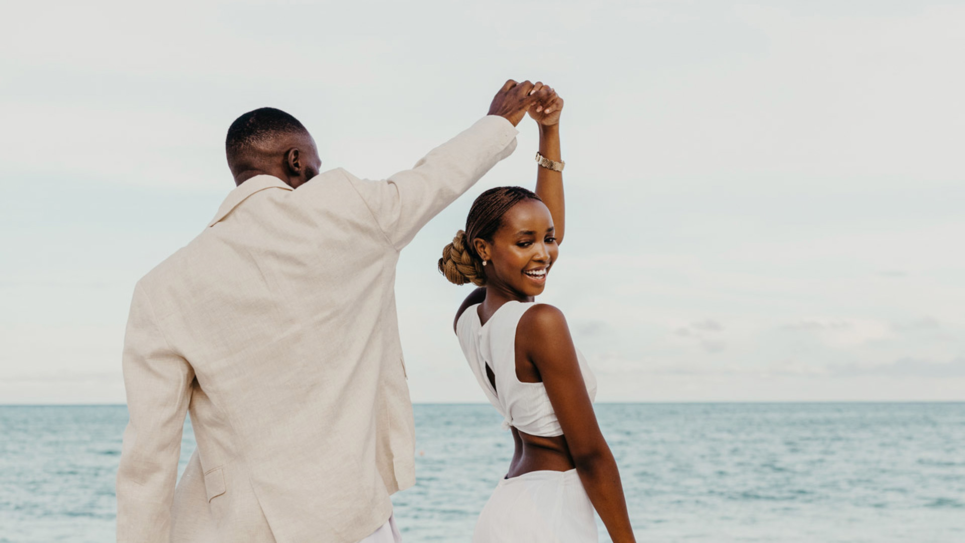 Couple on the beach of LUX* Marijani
